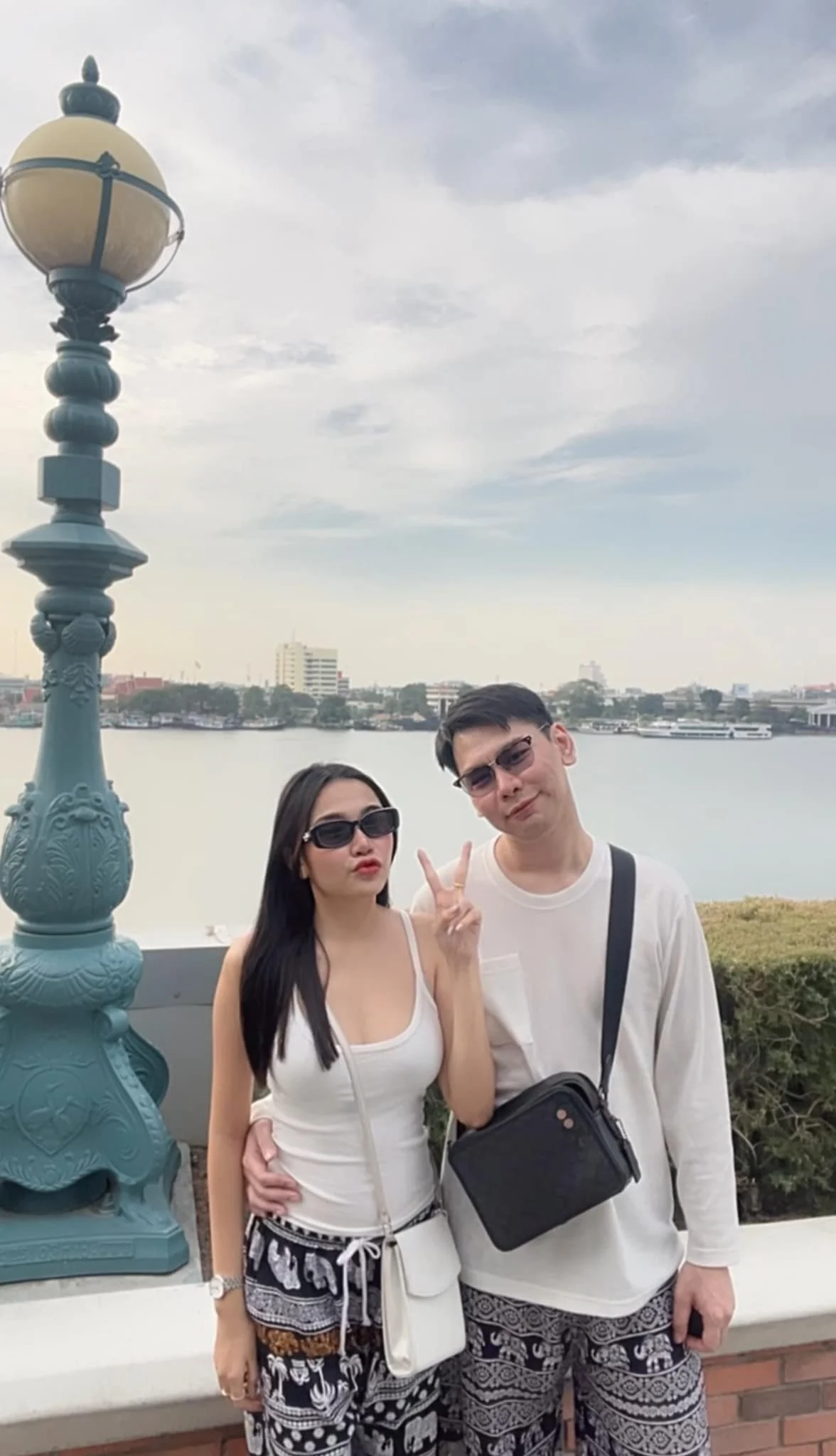 By the water